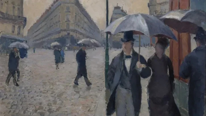 Un tableau de Caillebotte montrant des promeneurs parisines sous un parapluie. 
