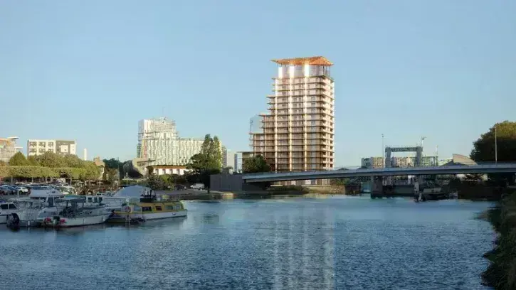 Ouvert sur l'Erdre et la Loire, le projet associe une piscine nordique et une tour de logements. © Lina Ghotmeh - Architecture.